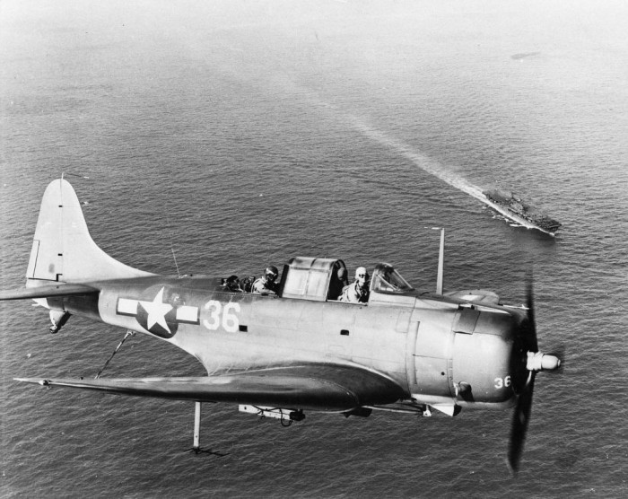 VALMY 20-SBD-5ofBombingSquadronTenVB-10picturedinthelandingpatternaboaveUSSEnterpriseCV-6duringoperationsinthePacific_zps904d01c6.jpg