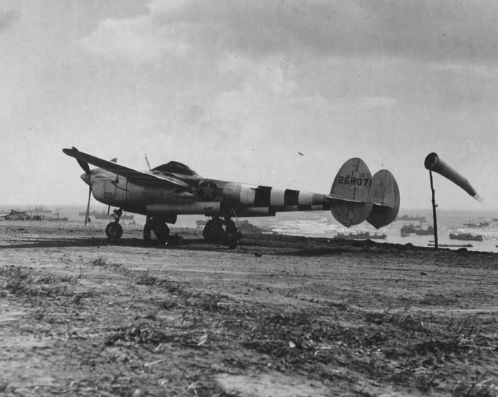 VALMY P-38Lightningofthe392ndFS367thFGontheairfieldatStLaurent-sur-MerNormandywithOmahaBeachinthebackground_zps174dab90.jpg