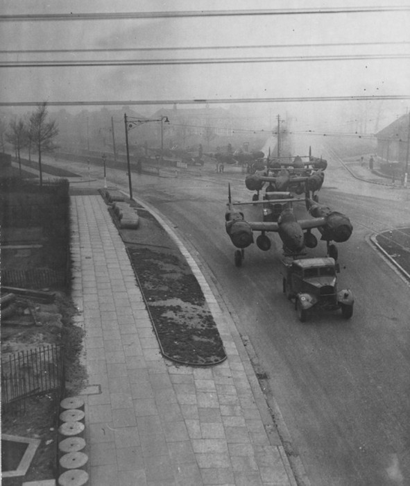 P-38LightningsbeingtowedalongQueenVALMY sDriveinLiverpoolonthewaytoLiverpoolAirportSpekeEnglandonJanuary91943_zpsc378444a.jpg